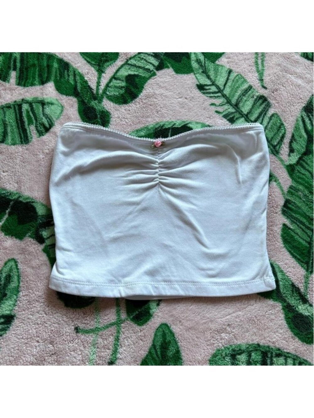 White cropped tube top with pink rose detail